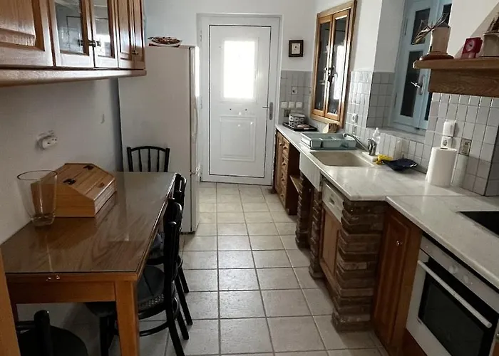 Апартаменты Camaraki Capitano House , Chora *